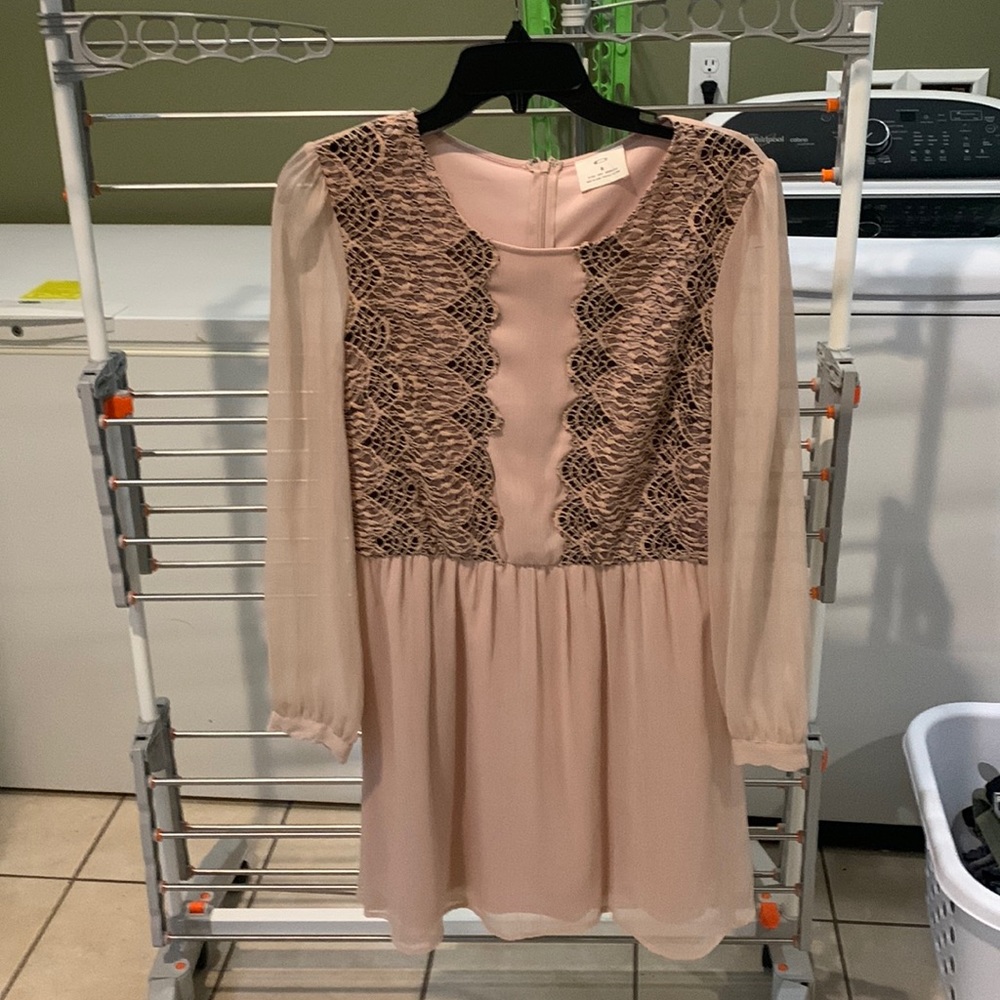 Peachy / mauve color.  Dress size 8